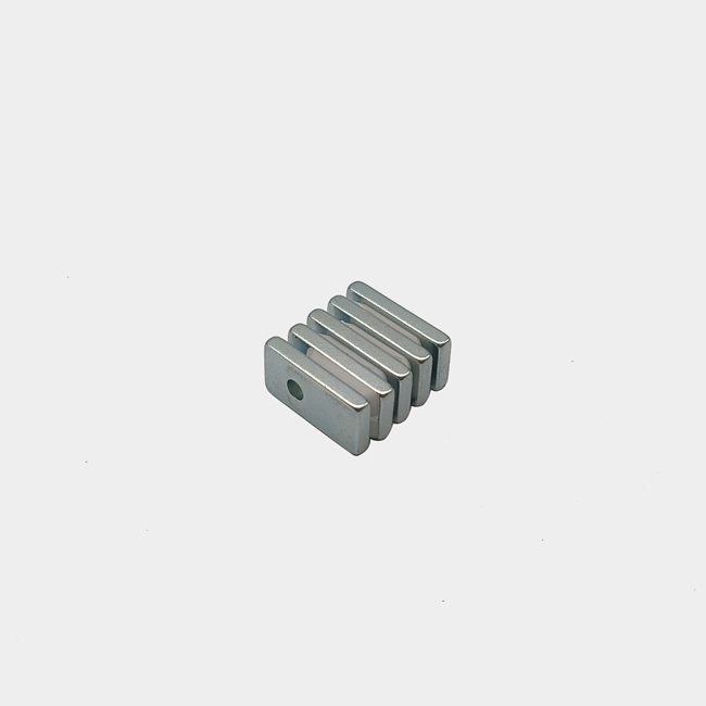 Custom shaped 20mm neodymium block magnet with offset hole