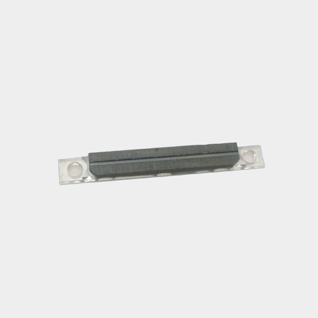 Custom shaped ferrite block magnet with groove and cut cor