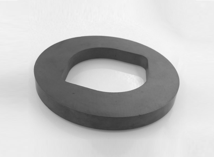 Picture is a large ring ferrite magnet commonly used in large loudspeakers