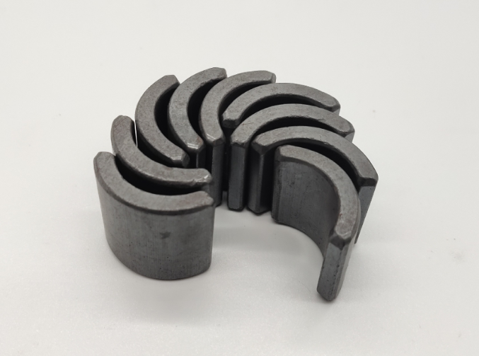 Wet press segmented ferrite magnets