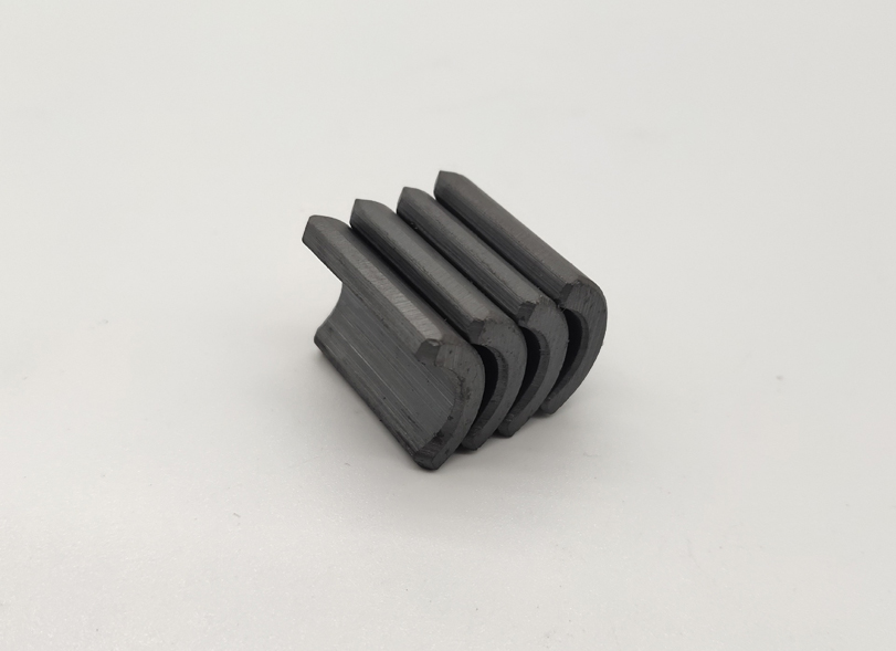 Wet pressed ferrite segment magnet