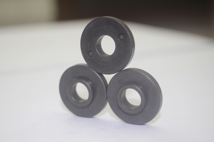 Convex injection molded ferrite magnetic ring