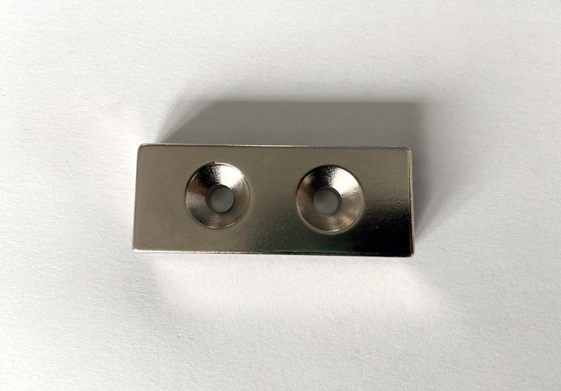 Rectangular neodymium magnet with double countersunk holes