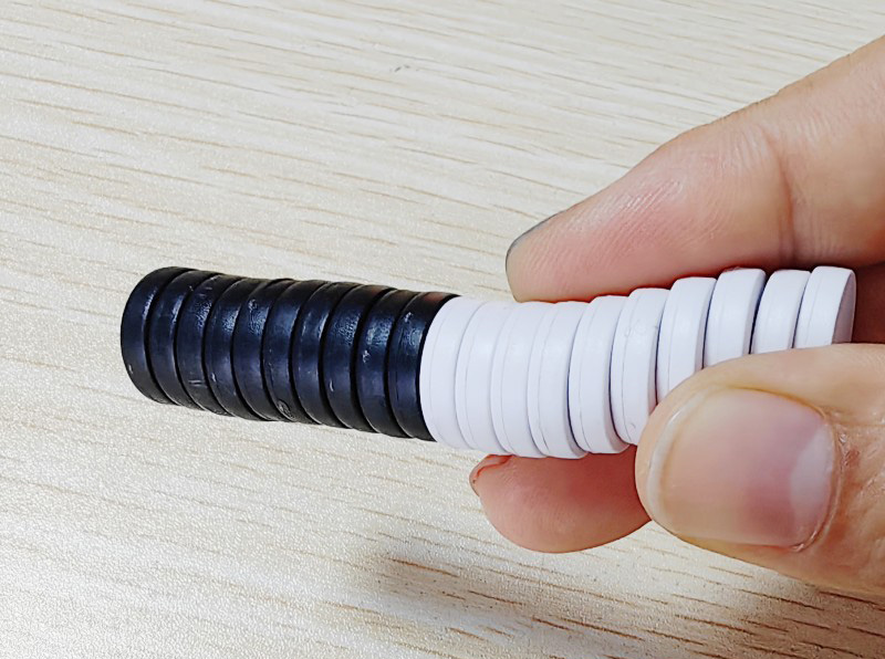 White rubber wrapped magnet