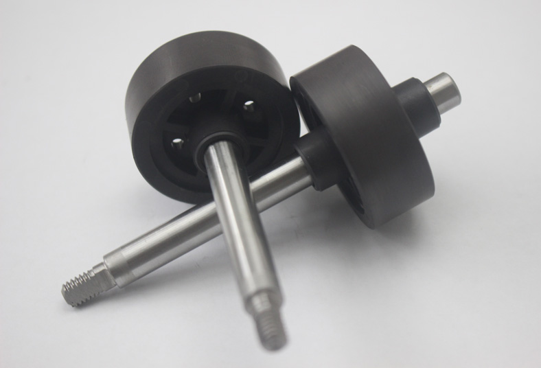Ferrite rotor magnet with shaft for injection molding