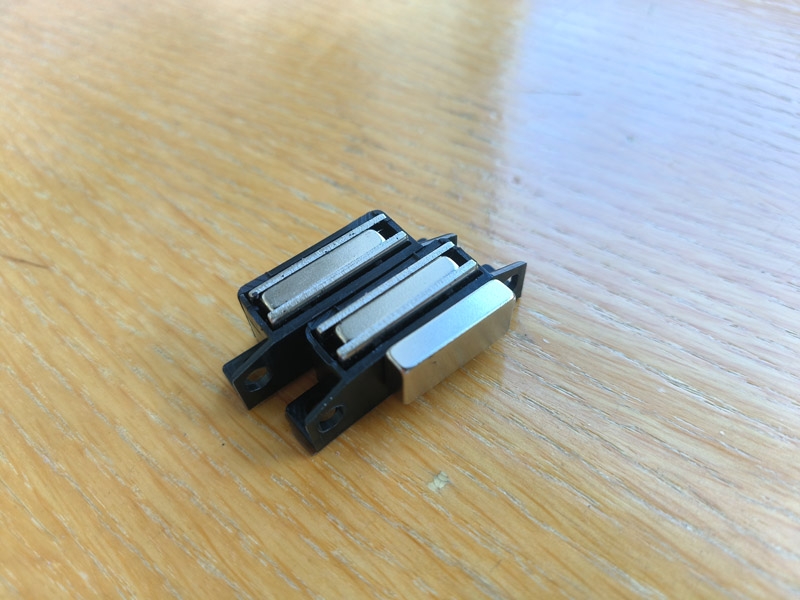 Floor mounted door magnet
