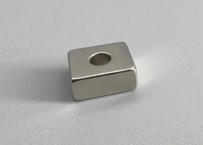 Rectangular magnet with a hole in the centre